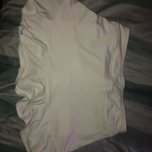 A white Slazenger golf skirt, have not been used
